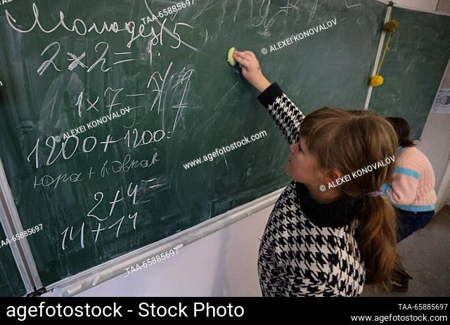 RUSSIA, ZAPOROZHYE REGION - DECEMBER 18, 2023: Kids in a classroom at school No 4 in the town of Pologi. The school has 440 students who come from nearby...