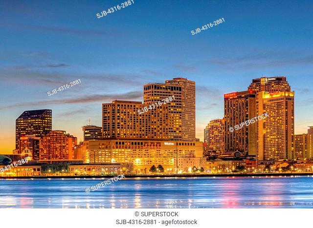 A high dynamic range, or HDR, image of high rise buildings of New Orleans, Louisiana and the Mississippi River, as seen from the Algiers Point Section of New...