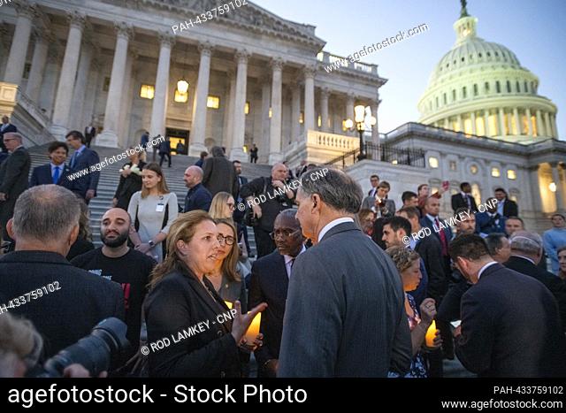 Adi Marciano, left, talks with United States Representative French Hill (Republican of Arkansas) as Congressional Members are joined by family members of...