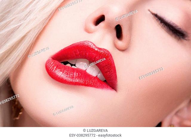 Woman biting lower lip