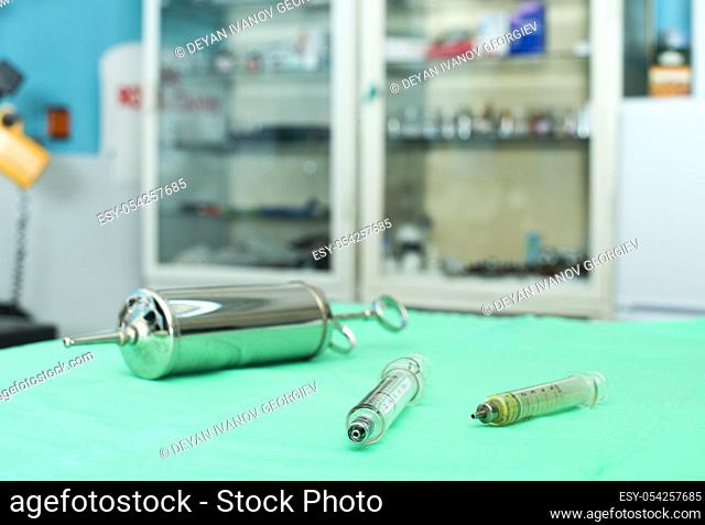 Big Glass syringe. Authentic image