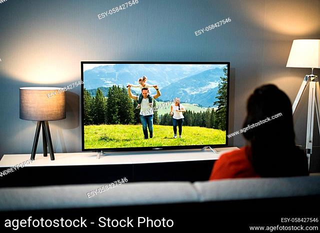 Woman Watching TV Movie At House Room