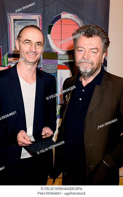 Ulrich Hamann, architect from Foster and Partners (L) and Museum Director Helmut Friedel pose in the new Lenbachhaus in Munich, Germany, 06 May 2013