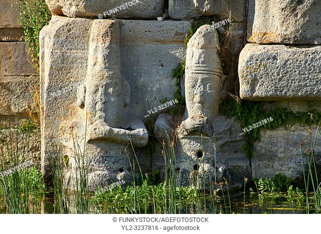 Close up of lower relief sculptures of Hittite gods at Eflatun P?nar ( Eflatunp?nar) Ancient Hittite relief sculpture monument and sacred pool