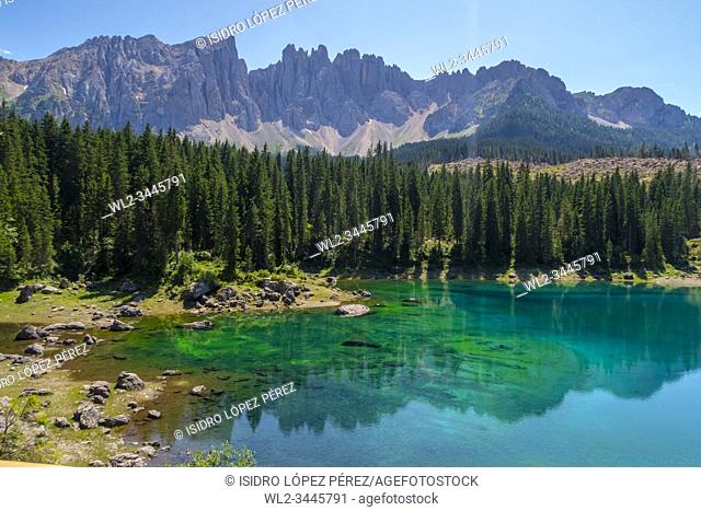 The Lake Carezza is a small alpine lake of the Dolomites of the South Tyrol, Italy. It is known for its marvelous colors and its view over the Rosengarten...