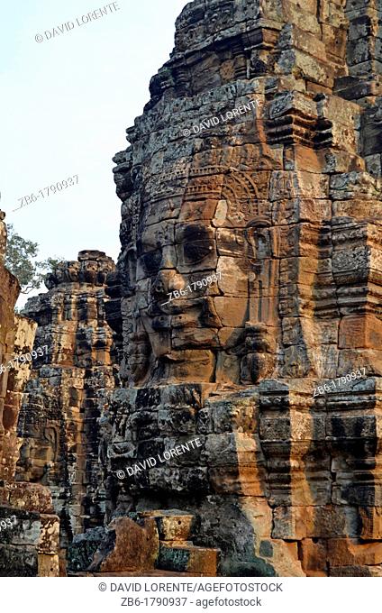 Profile and tower shaped face sculpted in Angkor Thom Bayon