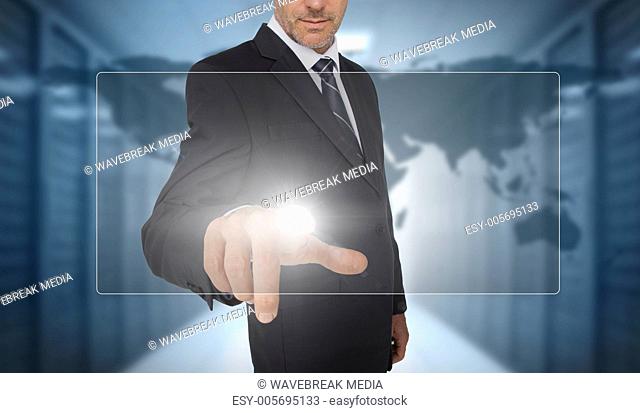 Businessman touching panel with world map on background