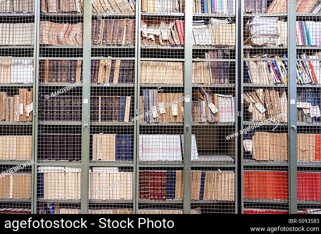 Locked bookshelves with plenty of old books, Portugal, Europe
