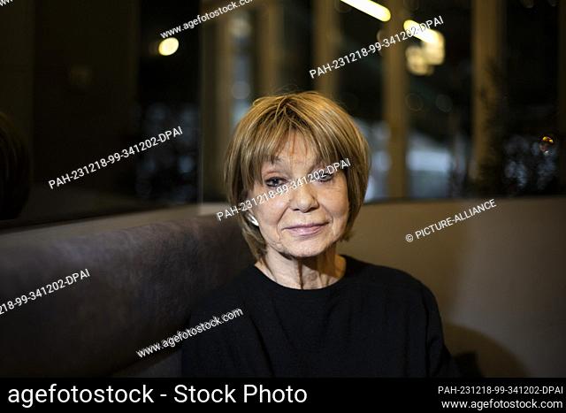 PRODUCTION - 18 December 2023, Berlin: Judy Winter, actress, sits in a Charlottenburg café at the end of an interview with the Deutsche Presse-Agentur on the...