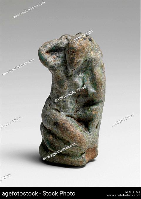 Faience statuette of Aphrodite. Period: Hellenistic; Date: 334-30 B.C; Culture: Egyptian, Ptolemaic; Medium: Faience; Dimensions: H.: 1 9/16 in. (3