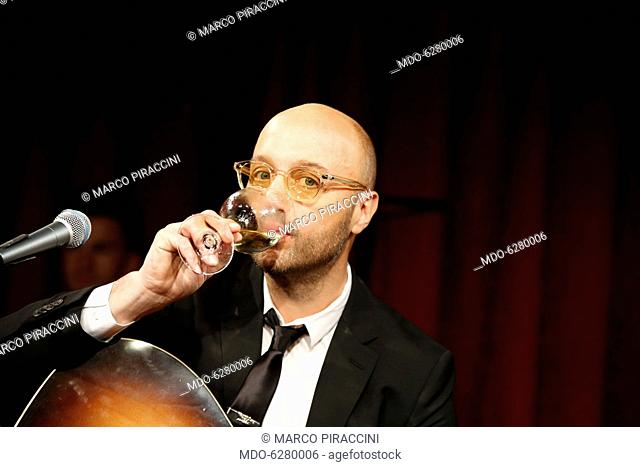 Entrepreneur and television personality Joe Bastianich on the stage of the Teatro Franco Parenti during his theatrical show Vino Veritas. Milan, Italy