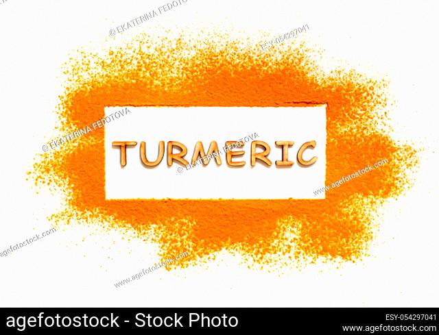 Turmeric powder with word Turmeric on a white backgroundd top view