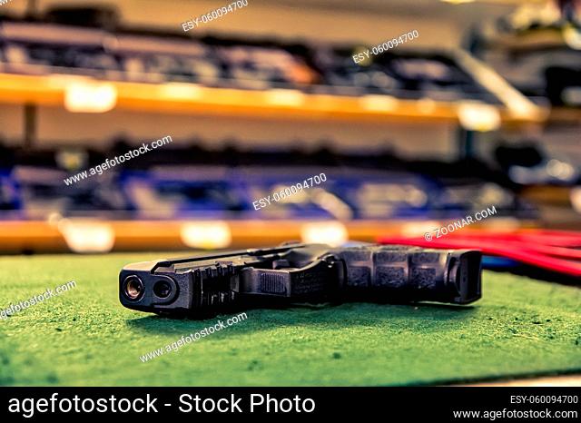 Black Combat Pistol Gun Shop Store Dealing Countertop Weapons Dangerous Sales Felt Surface Display