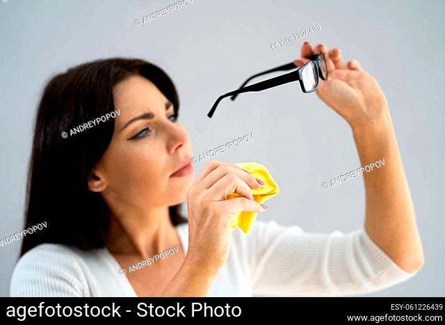 Obsessive Compulsive Perfectionist With OCD Disorder Cleaning Glasses