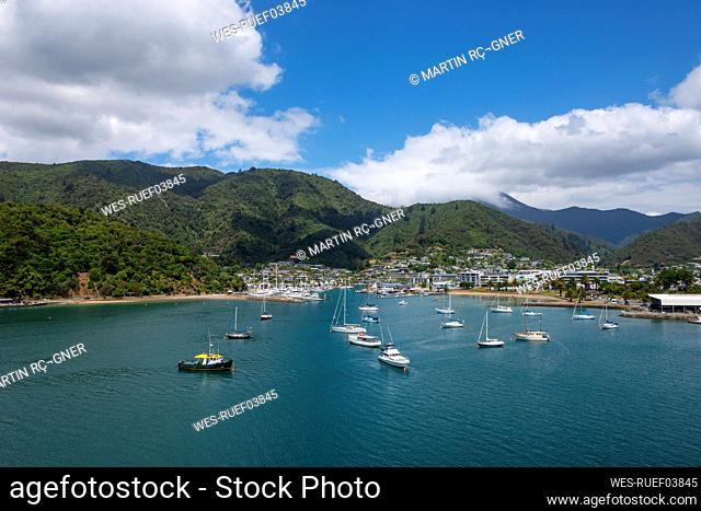 New Zealand, Marlborough, Picton, Boats in front of coastal town