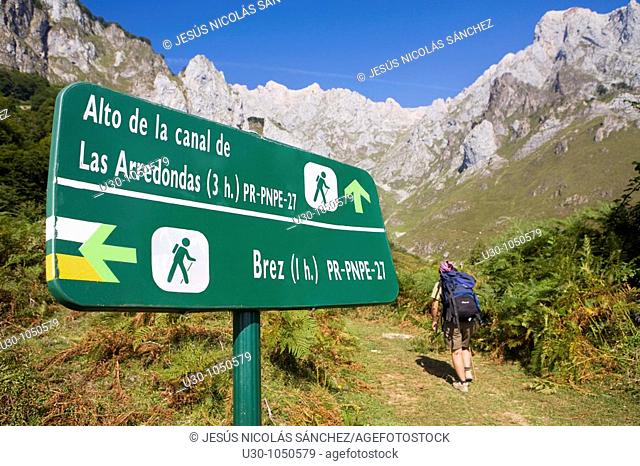 Mountaineers walking in the mountains of Andara Massif  Brez, in the municipality of Camaleño, in the Liébana Valley  Picos de Europa National Park  Cantabria...