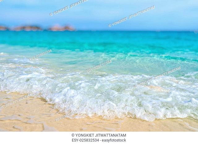 Tilt-Shift soft blur effect beautiful nature for background, blue sea sand and white waves on the beach during summer at Koh Miang island in Mu Ko Similan...