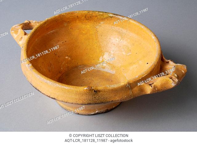 Yellow pap bowl on stand with two pinched, lobed ears, porcelain crockery holder soil find ceramic earthenware glaze lead glaze