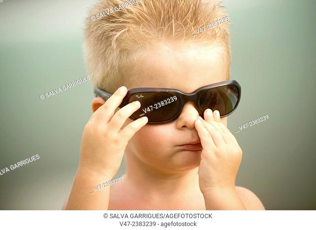 Portrait of a little boy with sunglasses