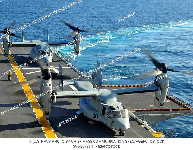 PACIFIC OCEAN (Feb. 1, 2012) MV-22 Osprey assigned to Marine Medium Tiltrotor Squadron (HMM) 166 land aboard the amphibious assault ship USS Peleliu (LHA 5)...