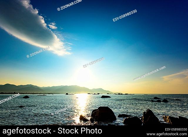 waves on the sea landscape on a background of blue sky with clouds
