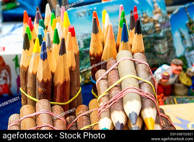 wood covered colorful pencils tied in bundles