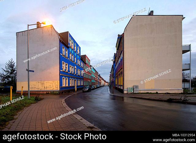 Germany, Saxony-Anhalt, Magdeburg, view of the colorful houses of Otto-Richter-Strasse in the Sudenburg district, the houses were colored according to plans by...