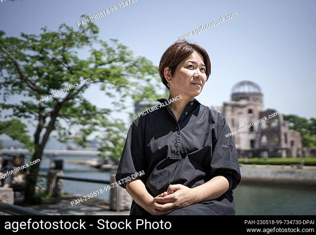 17 May 2023, Japan, Hiroshima: Sonoko Miyazaki, activist, taken during dpa interview, in front of Genbaku Dome in Hiroshima Peace Memorial Park