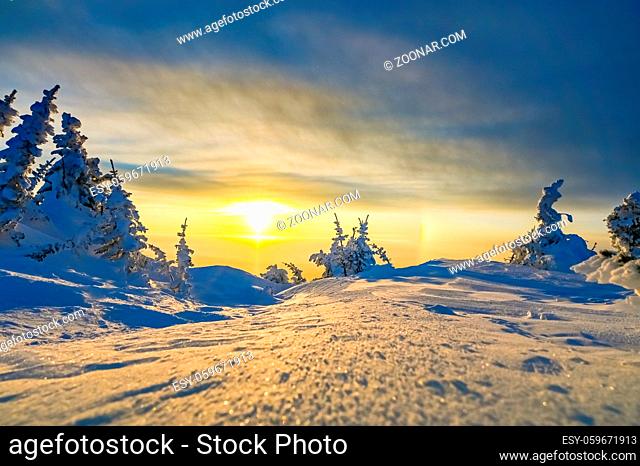 beautiful sunset in the mountains in winter Altai