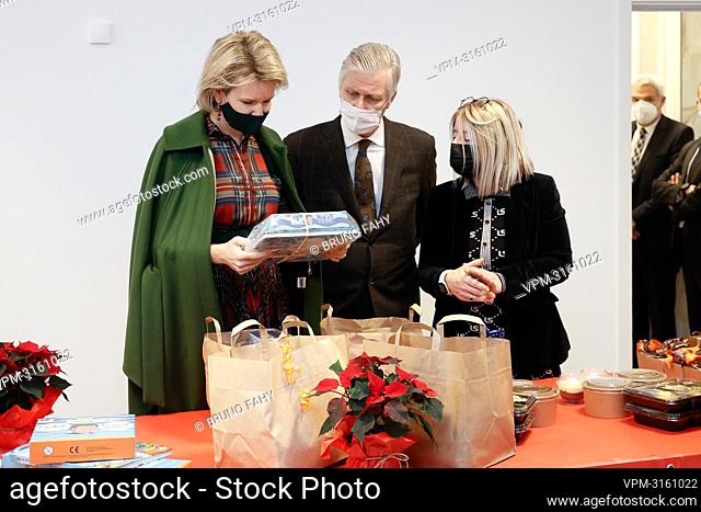 Queen Mathilde of Belgium and King Philippe - Filip of Belgium pictured during a Christmas activity organised by Caritas Secours and several local associations...