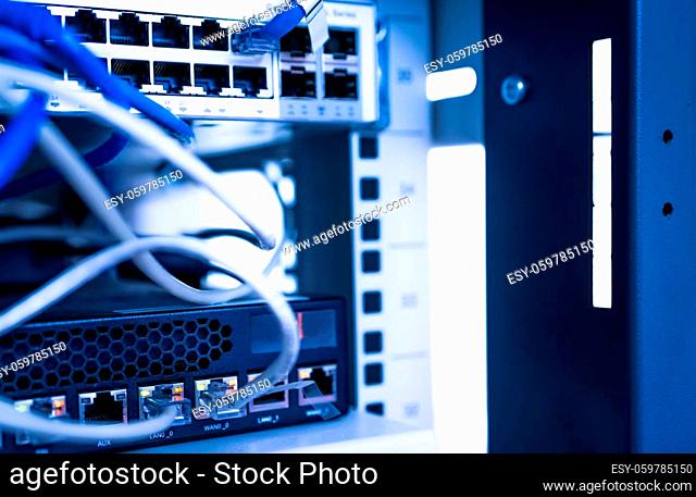 Network switch and ethernet cable in data center. Wifi plug of internet router for computer. Network hub. Communication networking wireless