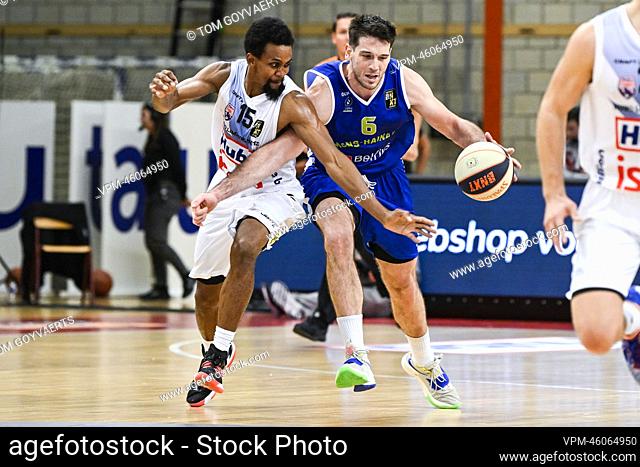 Limburg's Clifford Hammonds and Mons' Milivoje Mijovic pictured in action during a basketball match between Limburg United and Mons-Hainaut