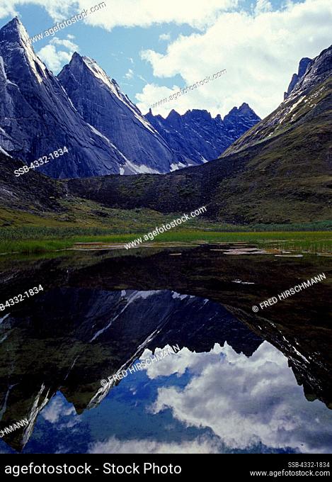 West Maiden and Camel of the Arrigetch Peaks reflected in alpine tarn, Aquarius Valley, Brooks Range, Gates of the Arctic National Park, Alaska