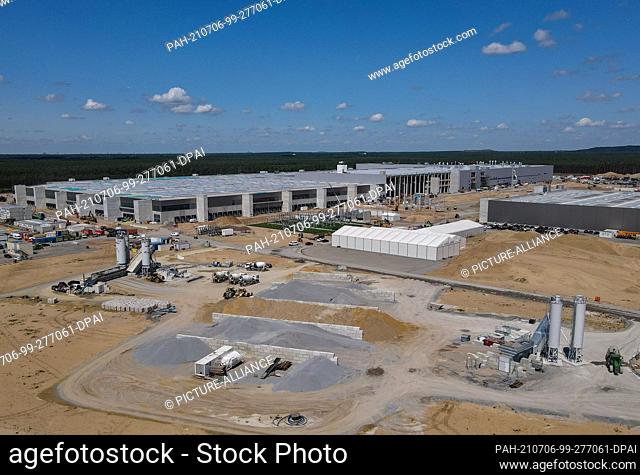 06 July 2021, Brandenburg, Grünheide: The construction site of the Tesla car factory east of Berlin (aerial view with a drone)