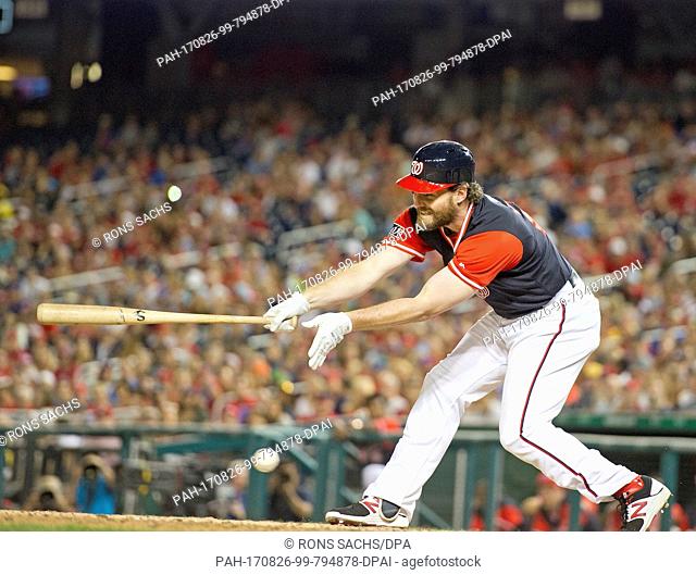 Washington Nationals second baseman Daniel Murphy (20) strikes out swinging to end the eighth inning against the New York Mets at Nationals Park in Washington