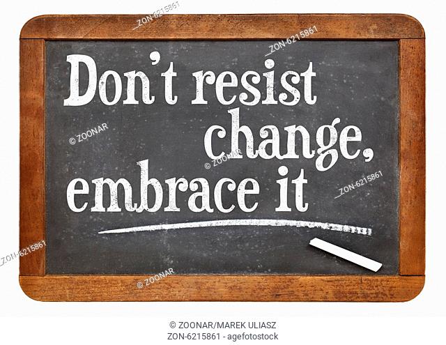 do not resist change, embrace it - motivational phrase on a vintage slate blackboard