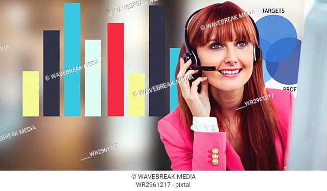 Redhead woman using headphones with graph in background
