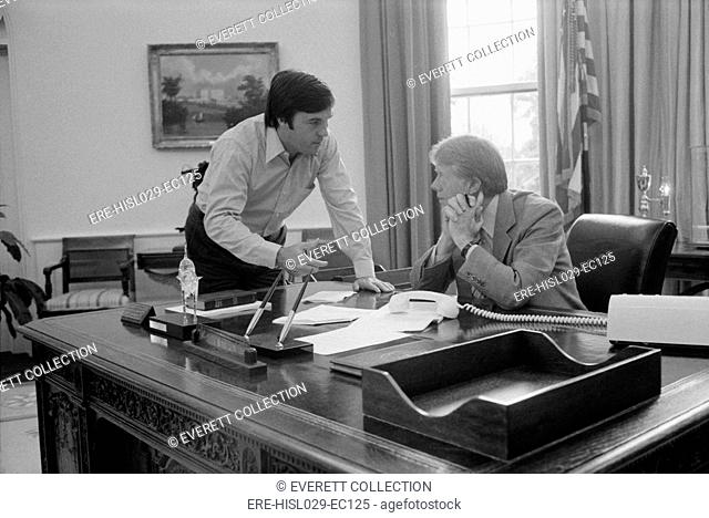 President Carter and his Chief of Staff Hamilton Jordan working on Panama Canal Treaty in the White House Oval Office. Ca. 1977-78
