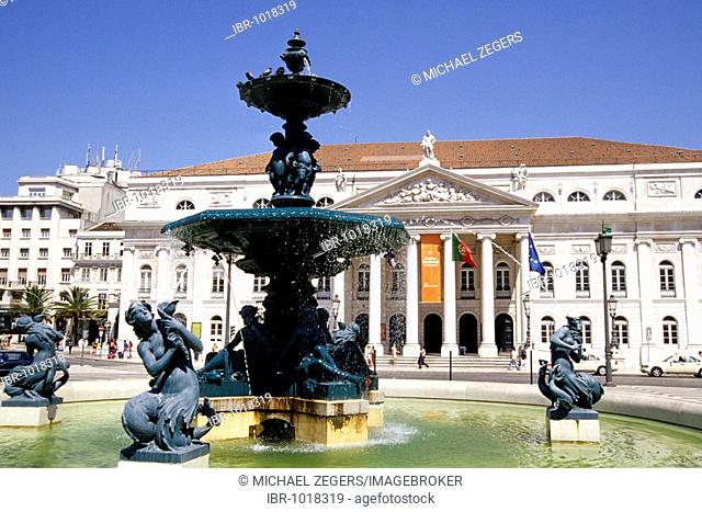 Teatro Nacional Dona Maria II, classicist national theatre on Rossio Square, in the front a fountain with sculptures on Rossio Square, Praca de Dom Pedro IV