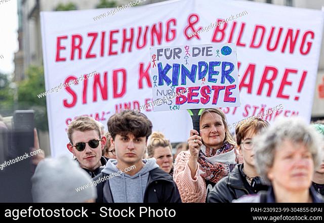 23 September 2023, Hamburg: A demonstration participant holds a sign with the inscription ""For the children only the best""