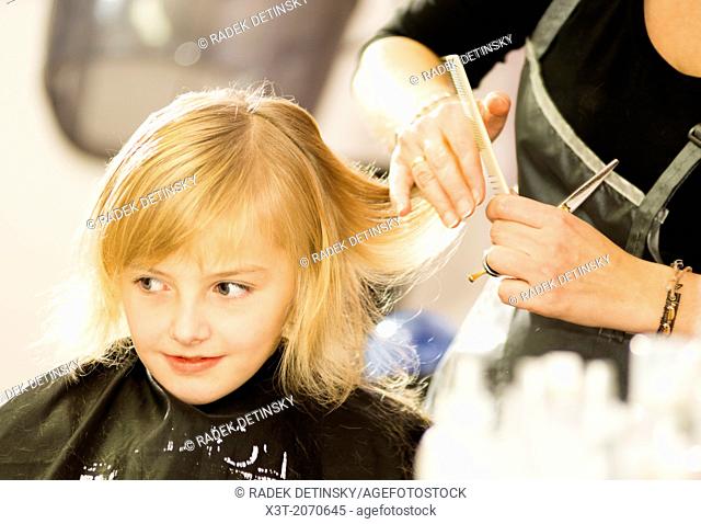 hair care - little girl at a hairdressing salon