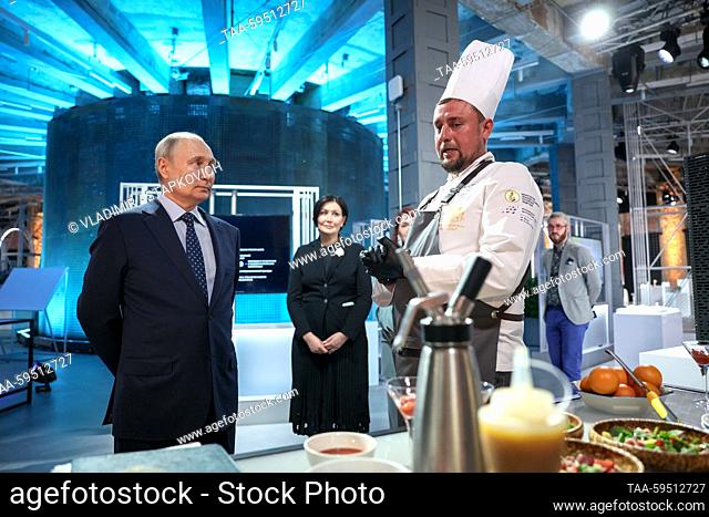 RUSSIA, MOSCOW - MAY 30, 2023: Russia’s President Vladimir Putin (L) and ASI (Agency for Strategic Initiatives) CEO Svetlana Chupsheva (C) talk to Doctor Whisky...
