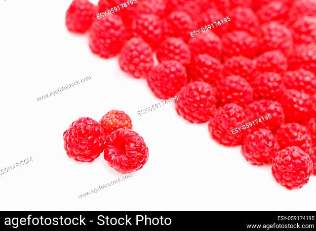 natural raspberry berries isolated on white background. copy space