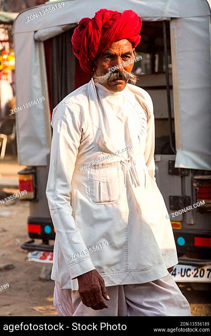PUSHKAR, INDIA - NOVEMBER 19, 2012: Indian elderly man at the camel fair in Pushkar