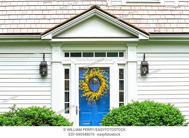 White House Blue Door Colorful Flowers Padnaram Village Dartmouth Masschusetts . .