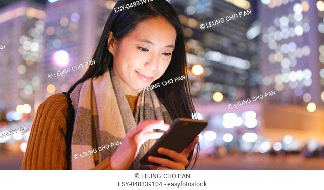 Asian Woman use of smart phone at outdoor