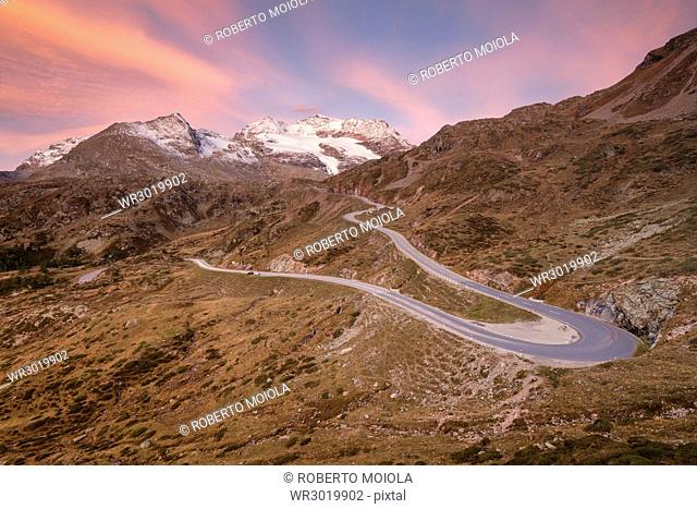 Road bends of Bernina Pass at dawn, Poschiavo Valley, Engadine, Canton of Graubunden, Switzerland, Europe