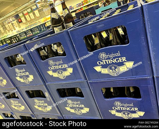 ORIGINAL OETTINGER BIER, stacked full beer crates in a drinks market, beer bottles. ?. - Munich/Bayern/Deutschland