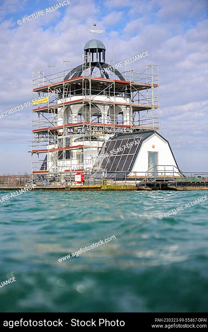 PRODUCTION - 22 March 2023, Saxony, Großpösna: View of the scaffolded floating church ""Vineta"" on Lake Störmthal. After a good decade on the water and...
