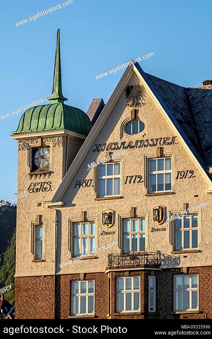 Old building with lettering, clock tower, Røst, harbor of Bergen, blue sky, Hordaland, Norway, Scandinavia, Europe